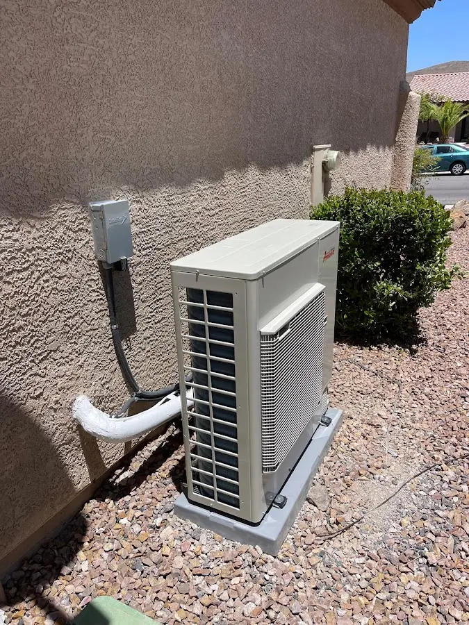 Residential air conditioning condenser unit in Rainsville